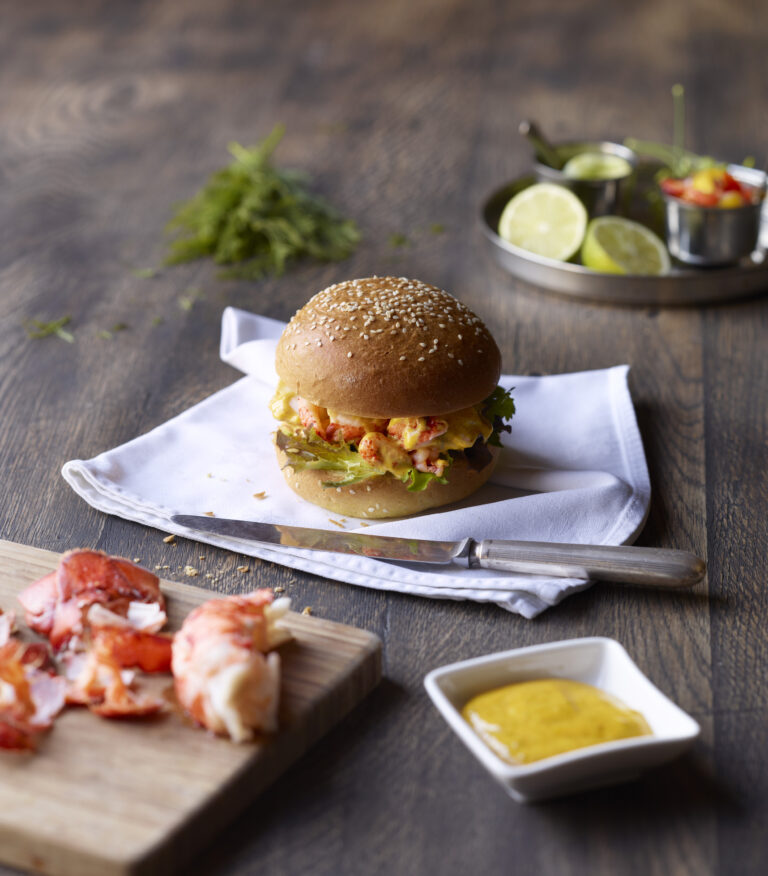 Photo of Brioche bun glazed seeded & sliced