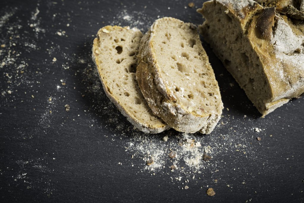 Rye bread displayed on a slate slab